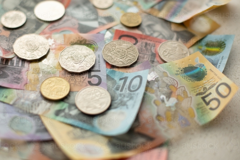 pile of different notes and coins aussie currency - Australian Stock Image