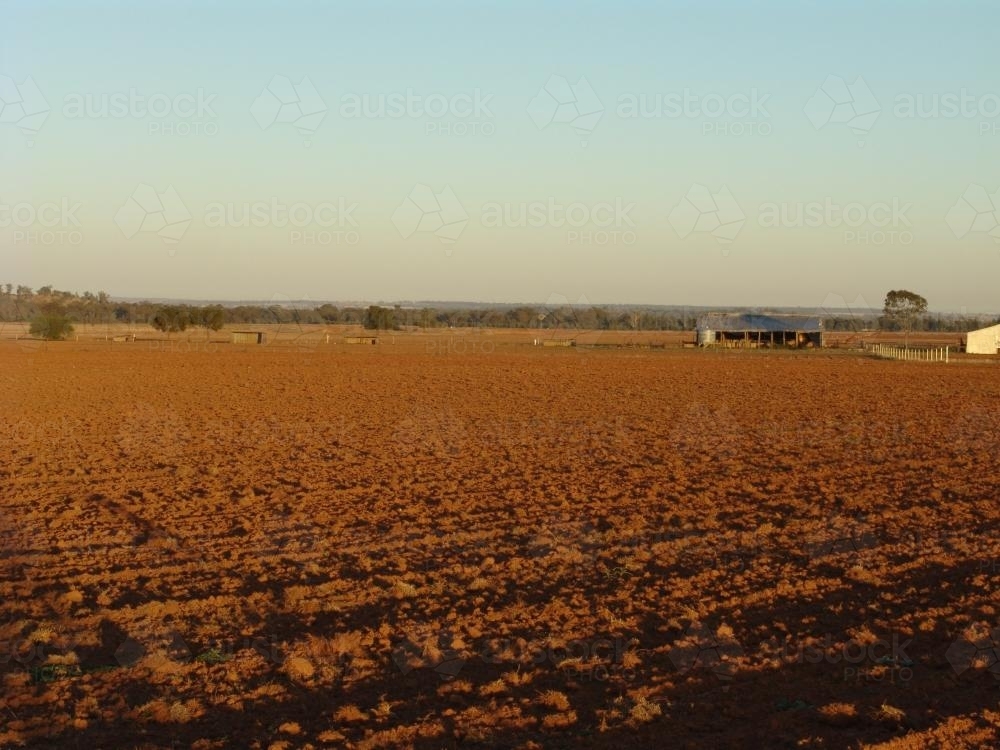 Ploughed paddock of red soil - Australian Stock Image