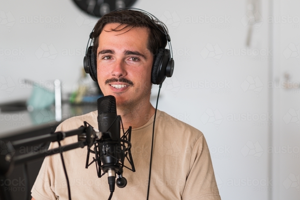 podcaster with microphone - Australian Stock Image