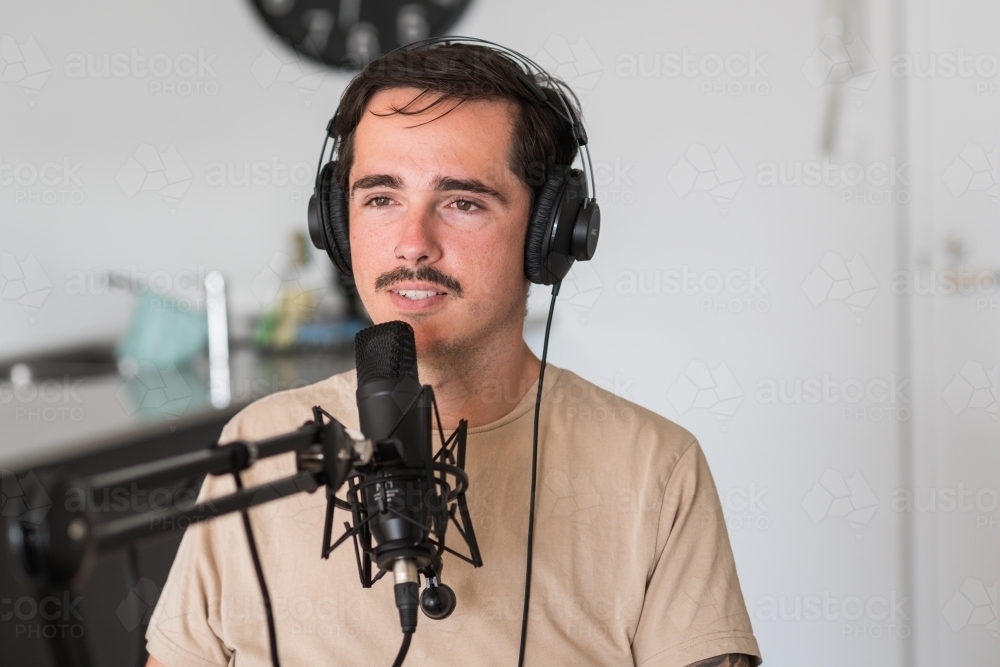 podcaster with microphone - Australian Stock Image