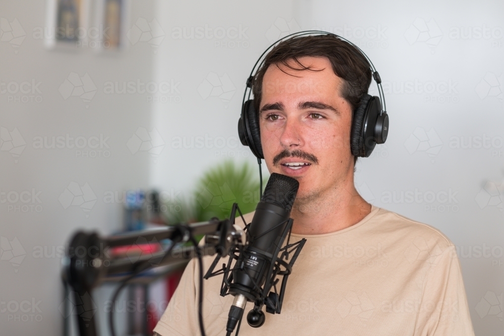 podcaster with microphone - Australian Stock Image