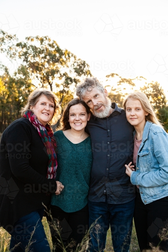 Portrait of a happy family, parents and teenage children - Australian Stock Image