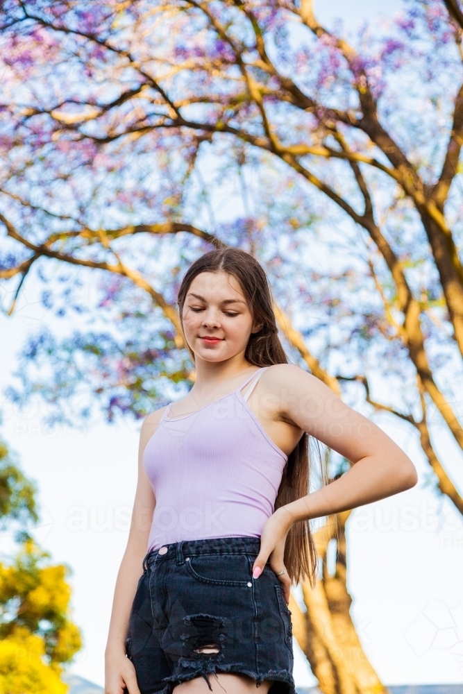 Portrait of a young teen looking to the side - Australian Stock Image