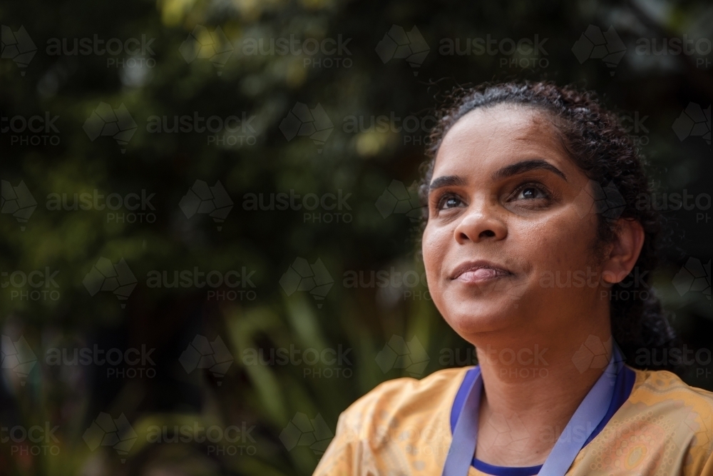 Portrait of Aboriginal woman outside - Australian Stock Image