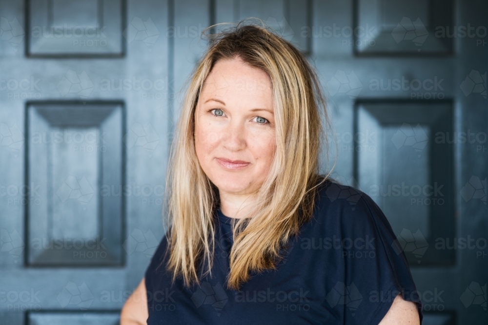 portrait of smiling 40something woman - Australian Stock Image