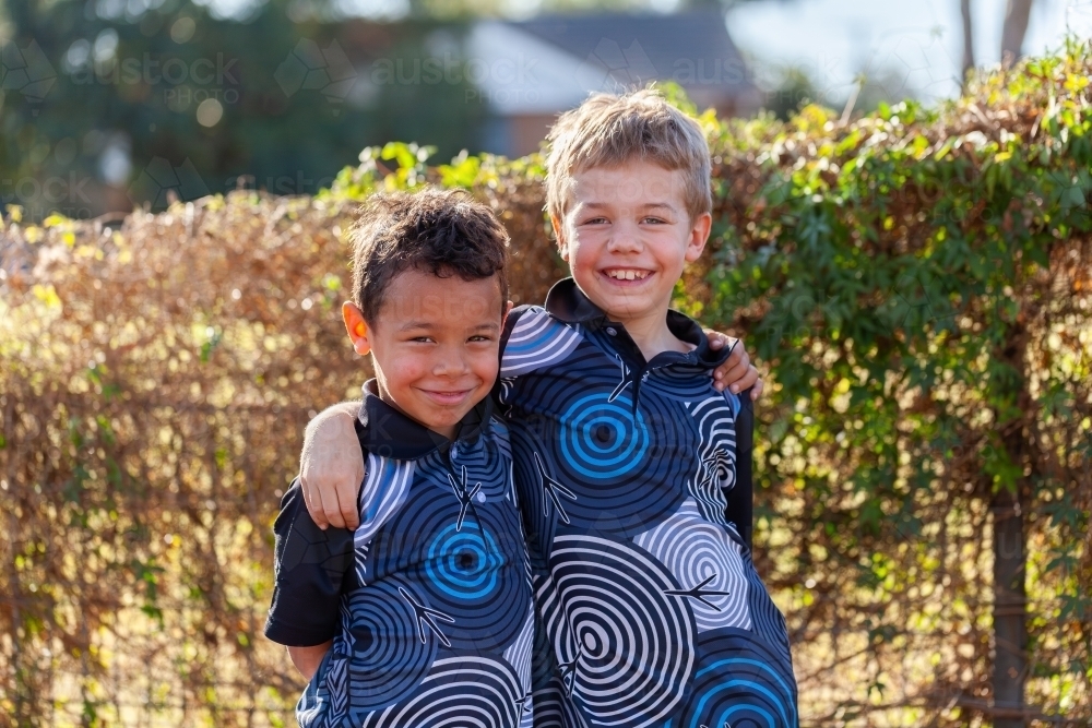 Portrait of two young happy Aussie kids who are brothers - Australian Stock Image