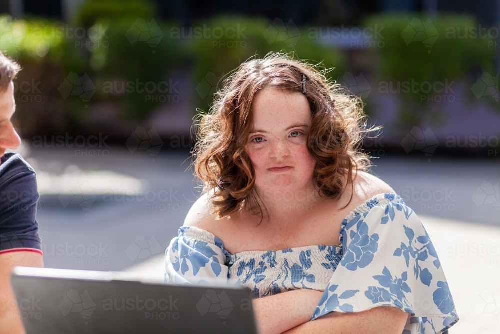 Portrait of unhappy young person with a disability - Australian Stock Image