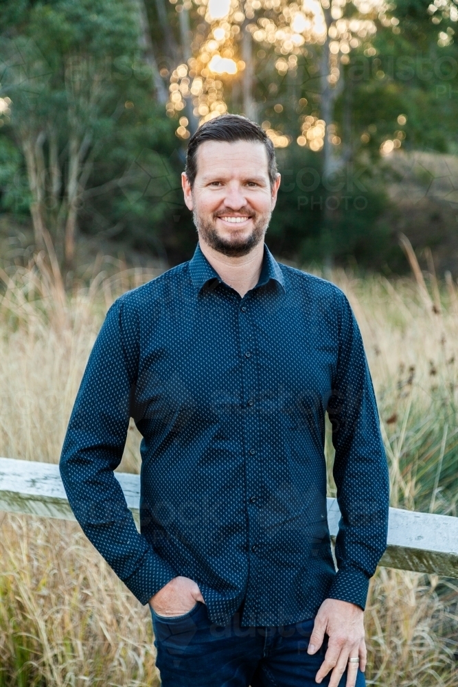 Portrait of well dressed man looking directly at the camera - Australian Stock Image