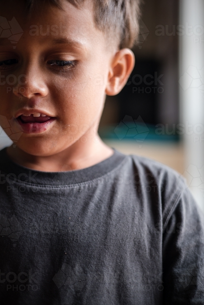 Portrait of young Aboriginal boy - Australian Stock Image