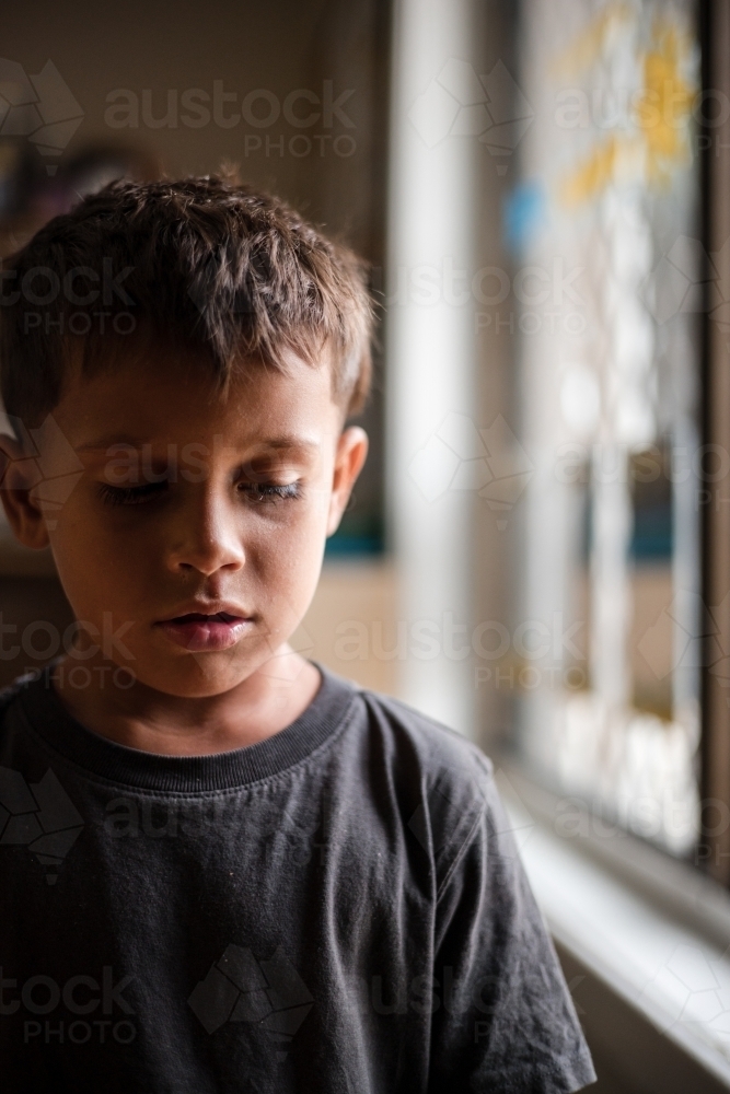 Portrait of young Aboriginal boy - Australian Stock Image