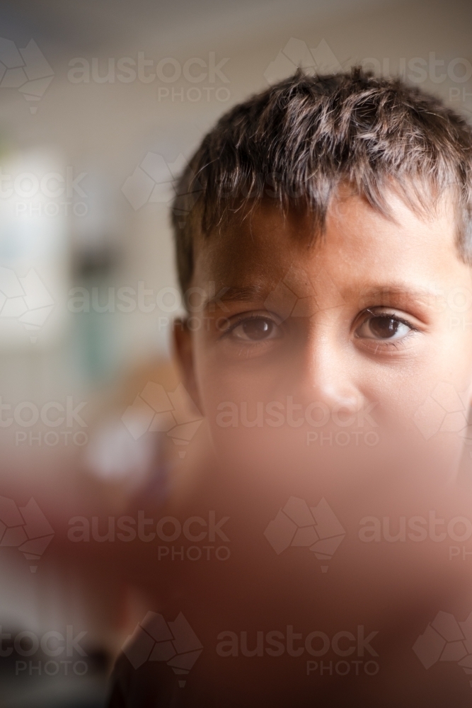 Portrait of young Aboriginal boy - Australian Stock Image