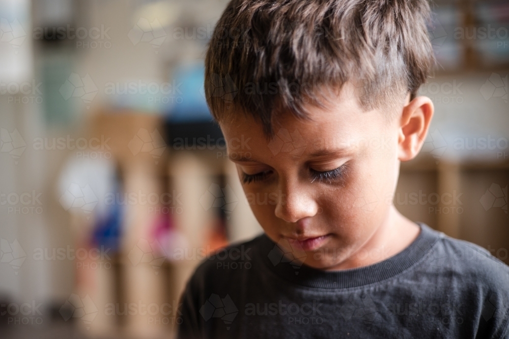 Portrait of young Aboriginal boy - Australian Stock Image