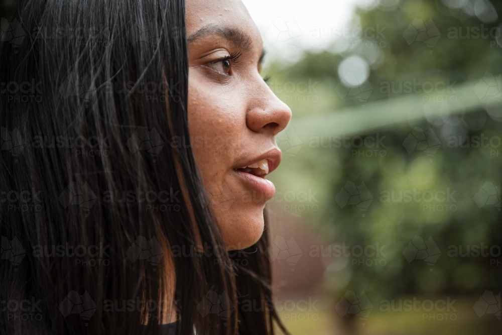 Portrait of young Aboriginal woman - Australian Stock Image