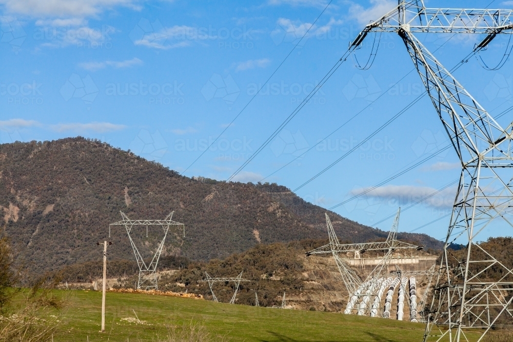 Power lines and power poles with high voltage electricity from Tumut 3 power station - Australian Stock Image