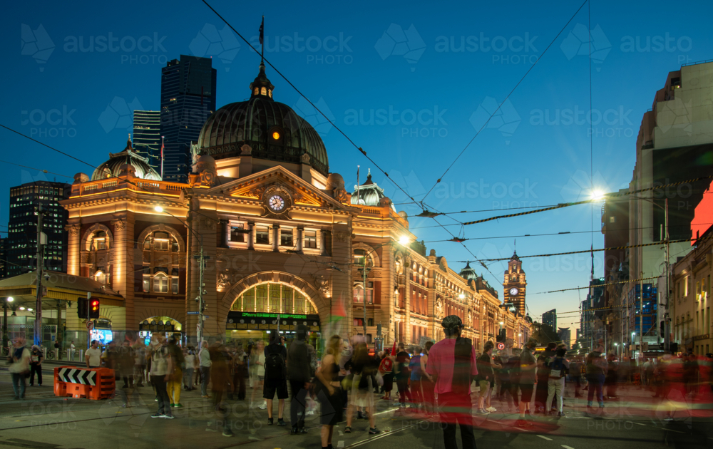 Protest rally in front of Flinders Street Station at night - Australian Stock Image