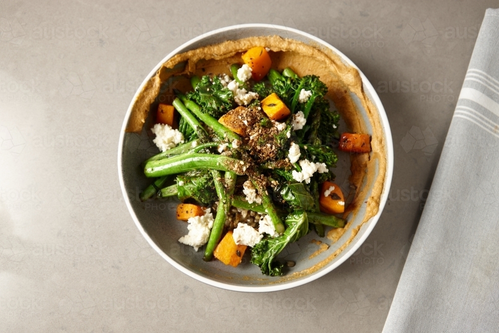 Pumpkin, broccli and feta salad - Australian Stock Image