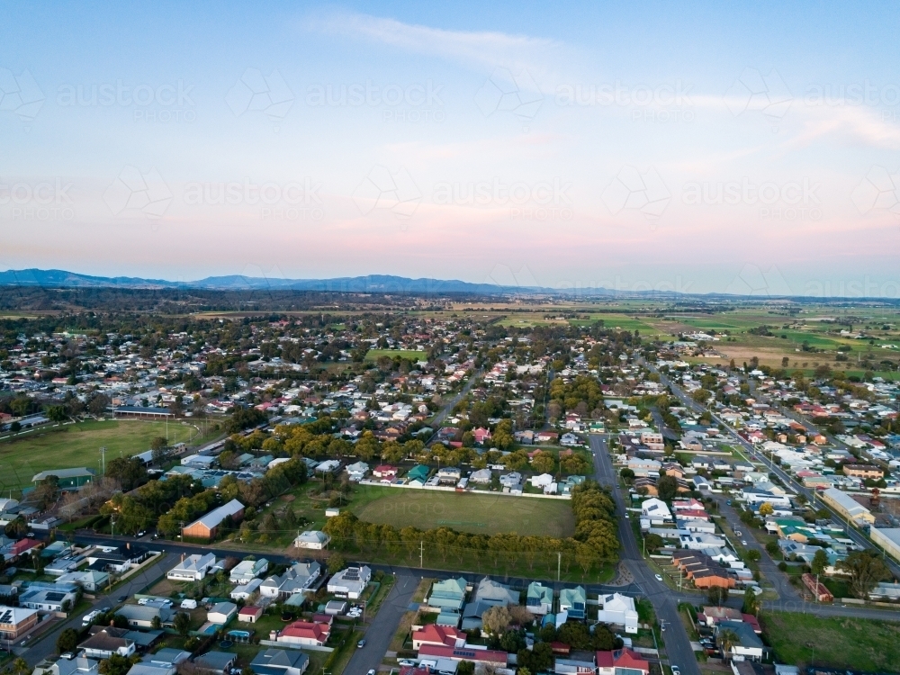 Quiet streets and homes at dusk in country town - Australian Stock Image