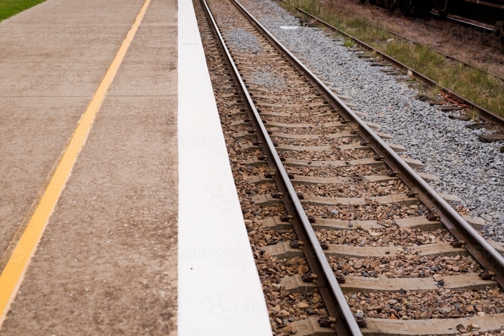 Railway track and platform at Harden railway station - Australian Stock Image