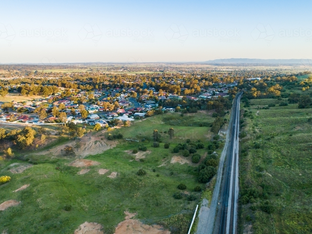 railway track stretching into the distance through Hunter Valley countryside - Australian Stock Image