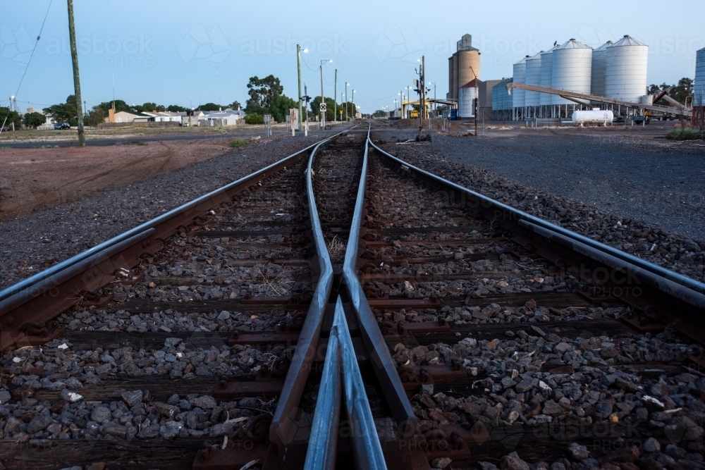 Railway tracks leading to the silos. - Australian Stock Image