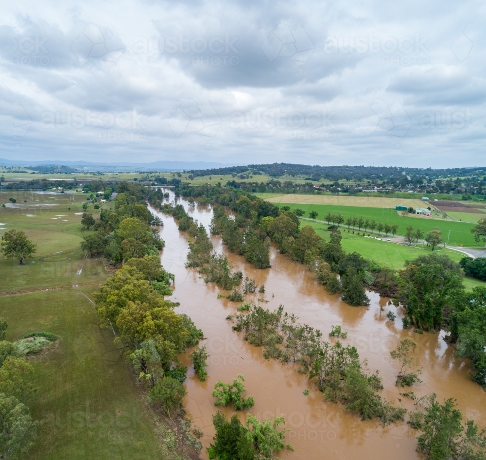 Receding floodwaters in river in the aftermath of a flood - Australian Stock Image