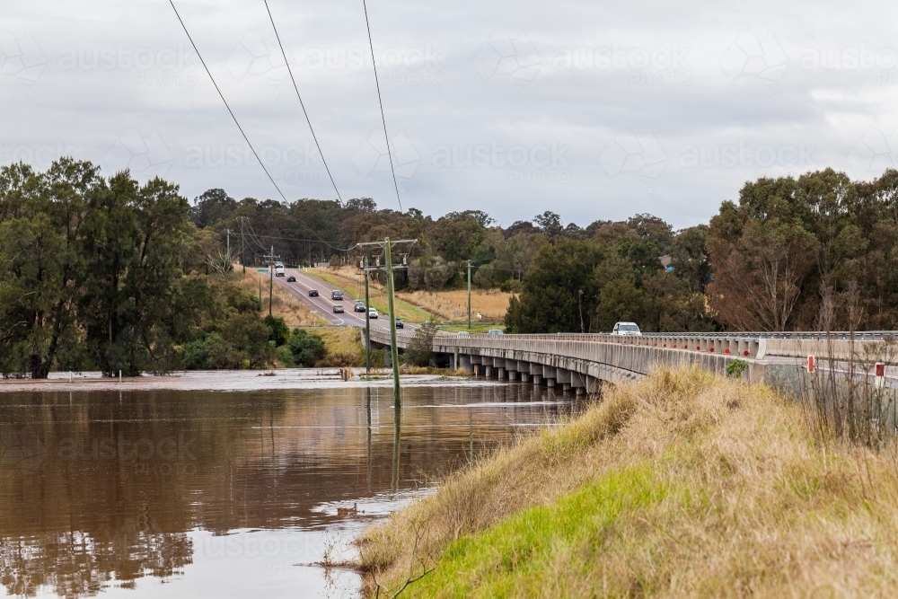 Redbournberry bridge near Singleton only access point to town during flood - Australian Stock Image