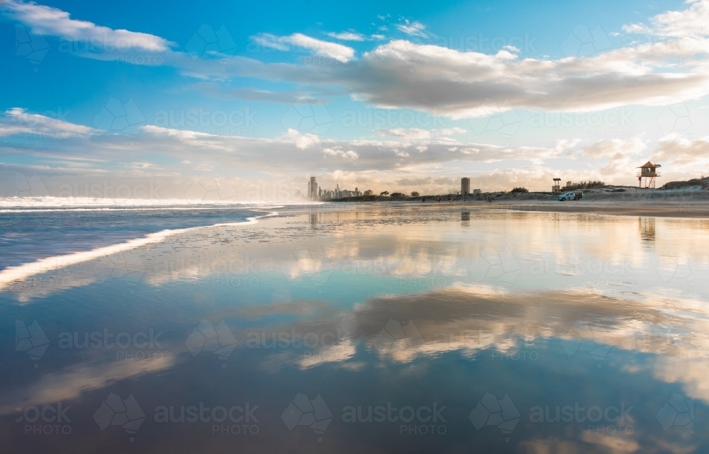 Reflections on the beach at the Gold Coast. - Australian Stock Image