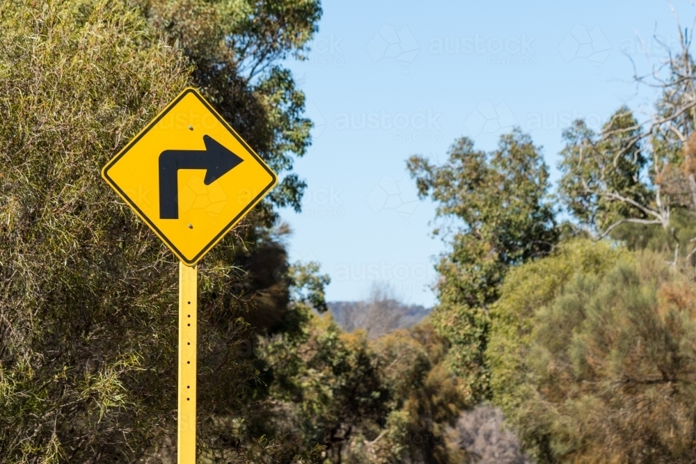 Right angle bend sign on country road - Australian Stock Image