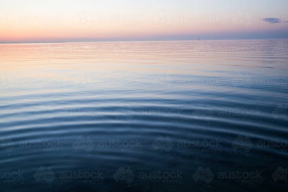 Ripples on the ocean in the evening - Australian Stock Image