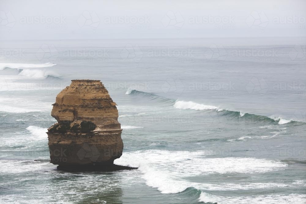 Rock formation in water down the Great Ocean Road - Australian Stock Image