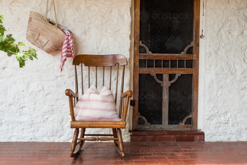 Rocking chair on a verandah. - Australian Stock Image