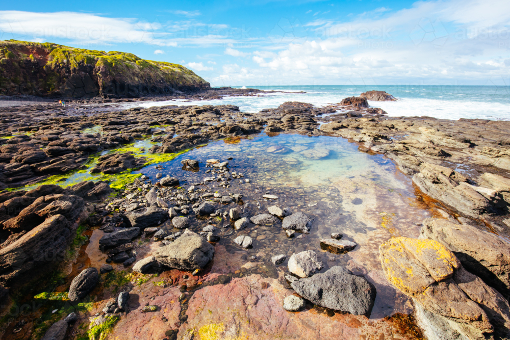 rockpool views around the popular tourist attraction of Flinders Blowhole on a cool winter's day - Australian Stock Image