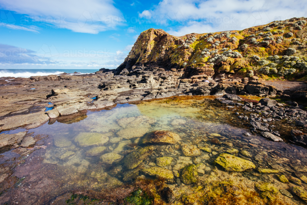 rockpool views around the popular tourist attraction of Flinders Blowhole on a cool winter's day - Australian Stock Image