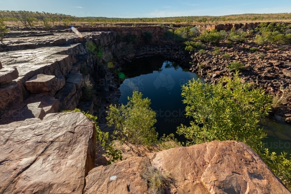 rocks and rock pool in the East Kimberley - Australian Stock Image