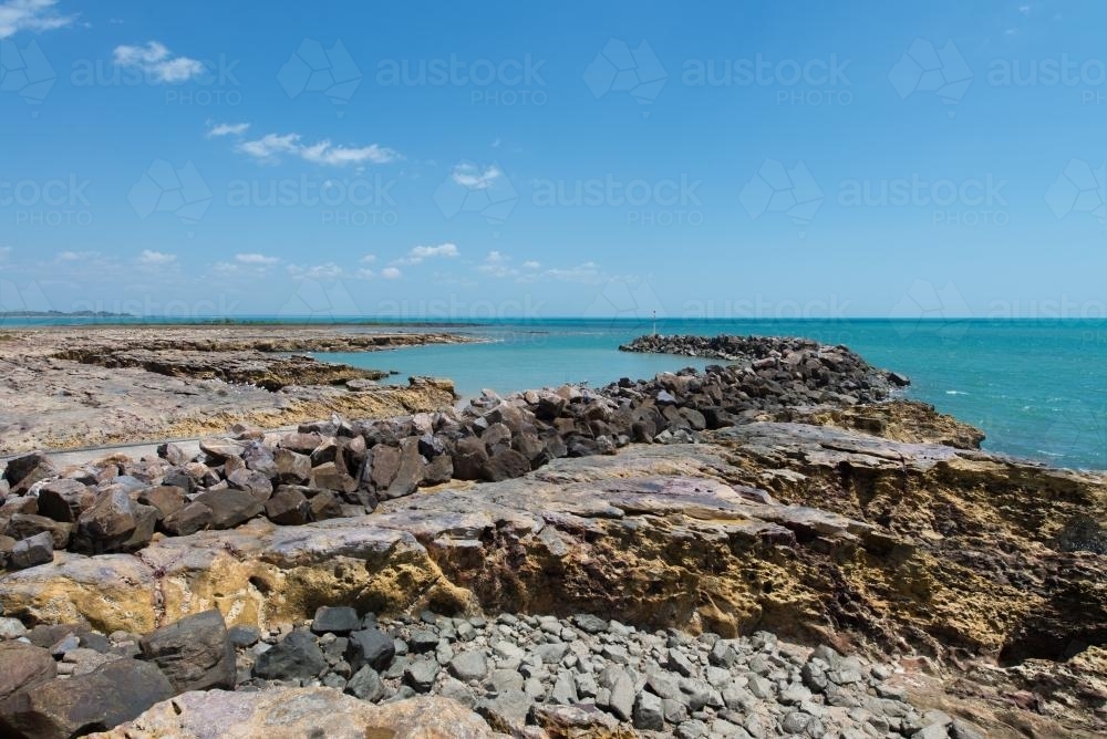 Rocky outcrop into bay - Australian Stock Image