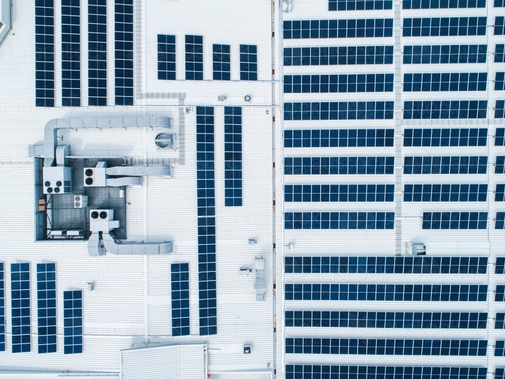 Roof of shopping center covered in solar panels - Australian Stock Image