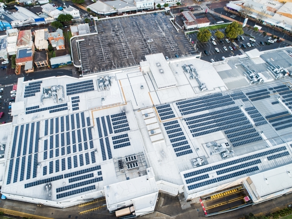 Roof of shopping centre covered in solar panels in town of Singleton - Australian Stock Image