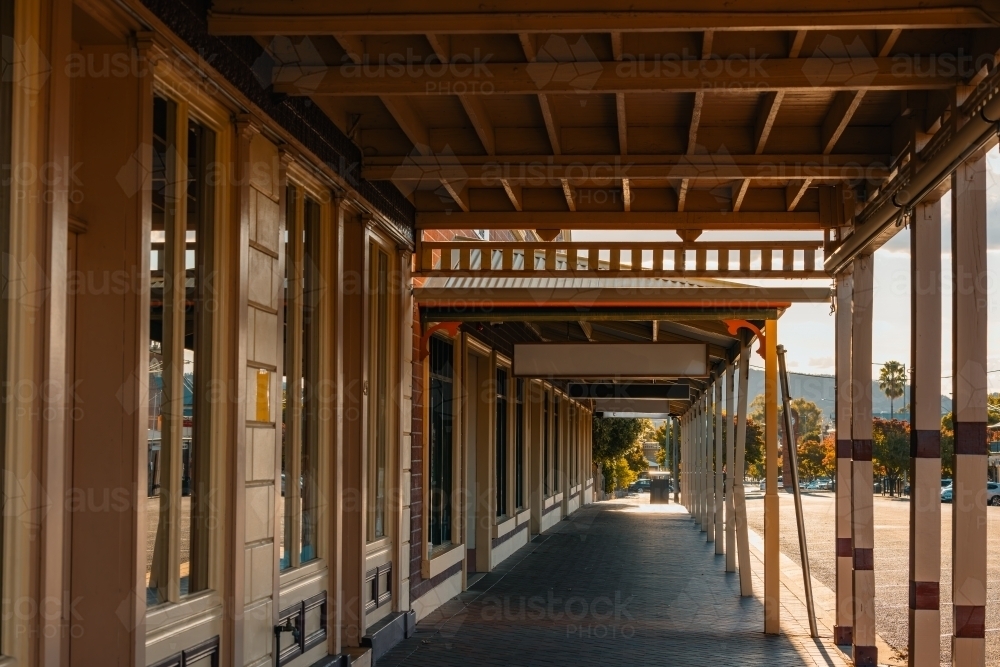 Row of verandahs covering footpath along shopfronts in small regional town - Australian Stock Image