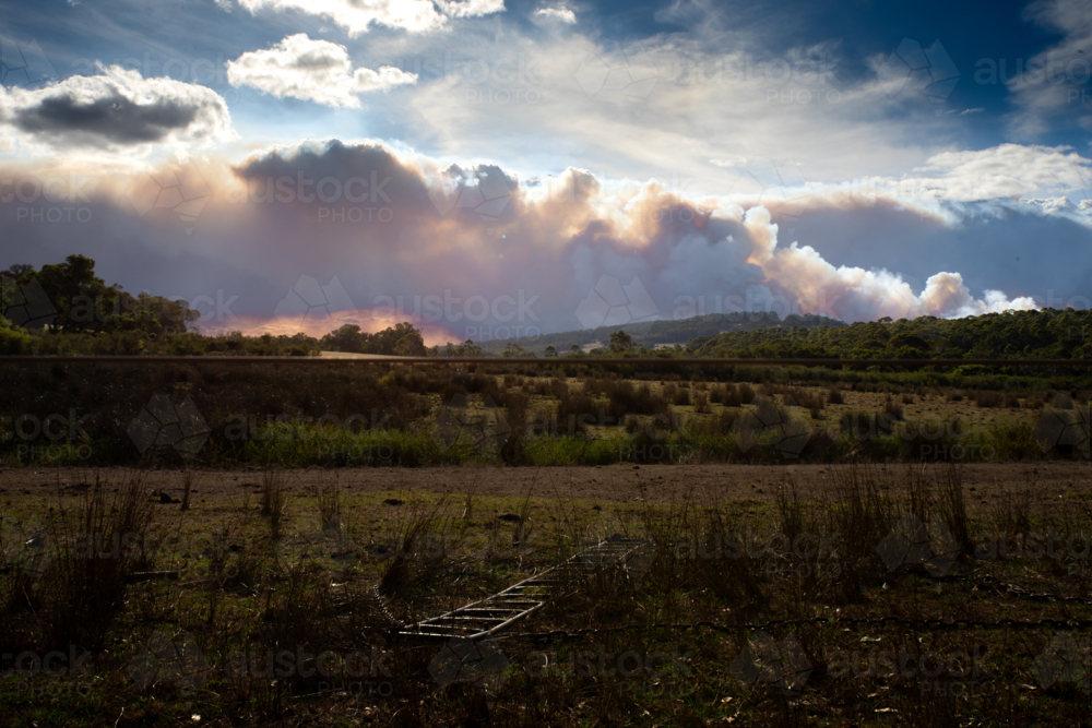 Rural Paddock Scene on an afternoon with bushfire smoke on horizon - Australian Stock Image