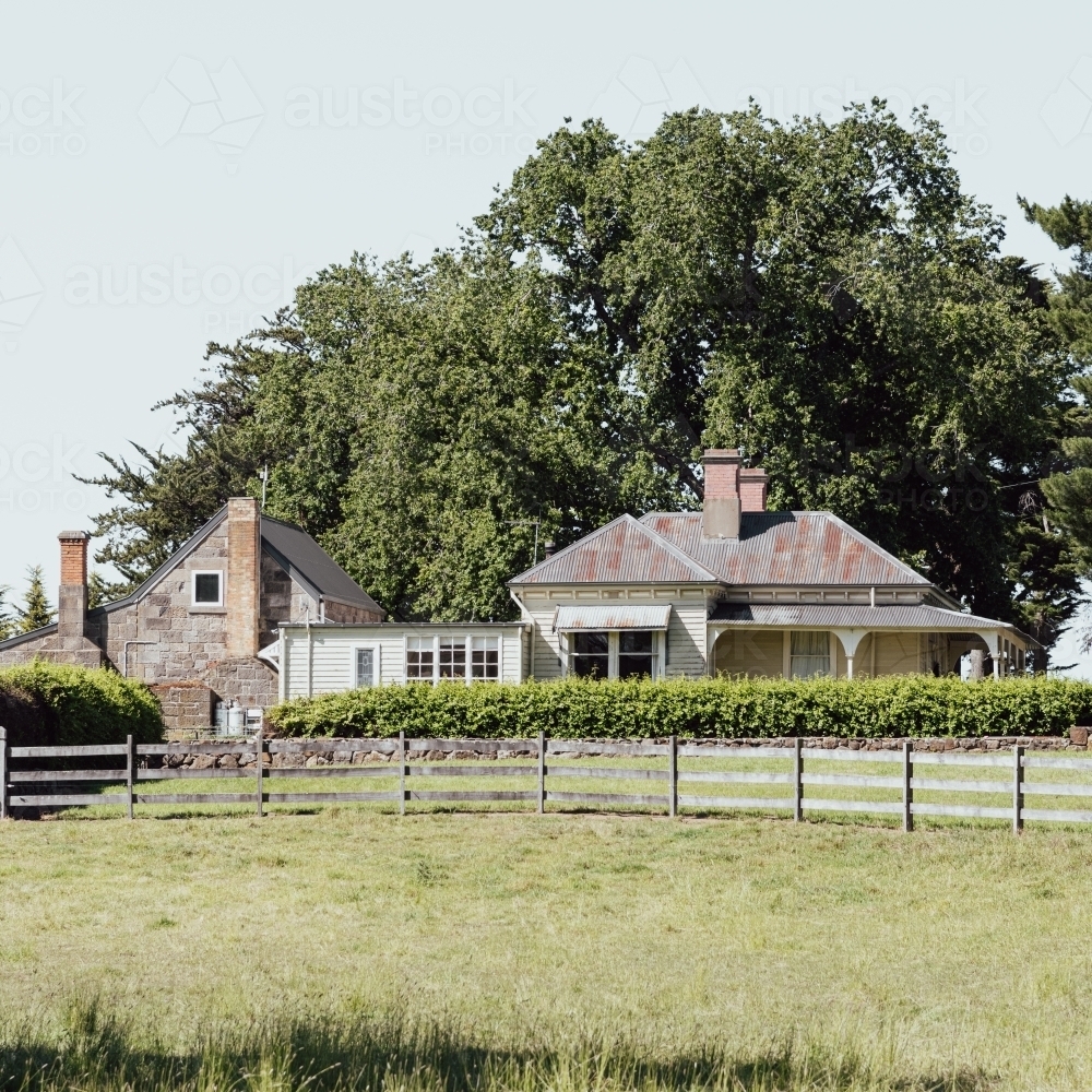 rural victorian home with wooden fence - Australian Stock Image