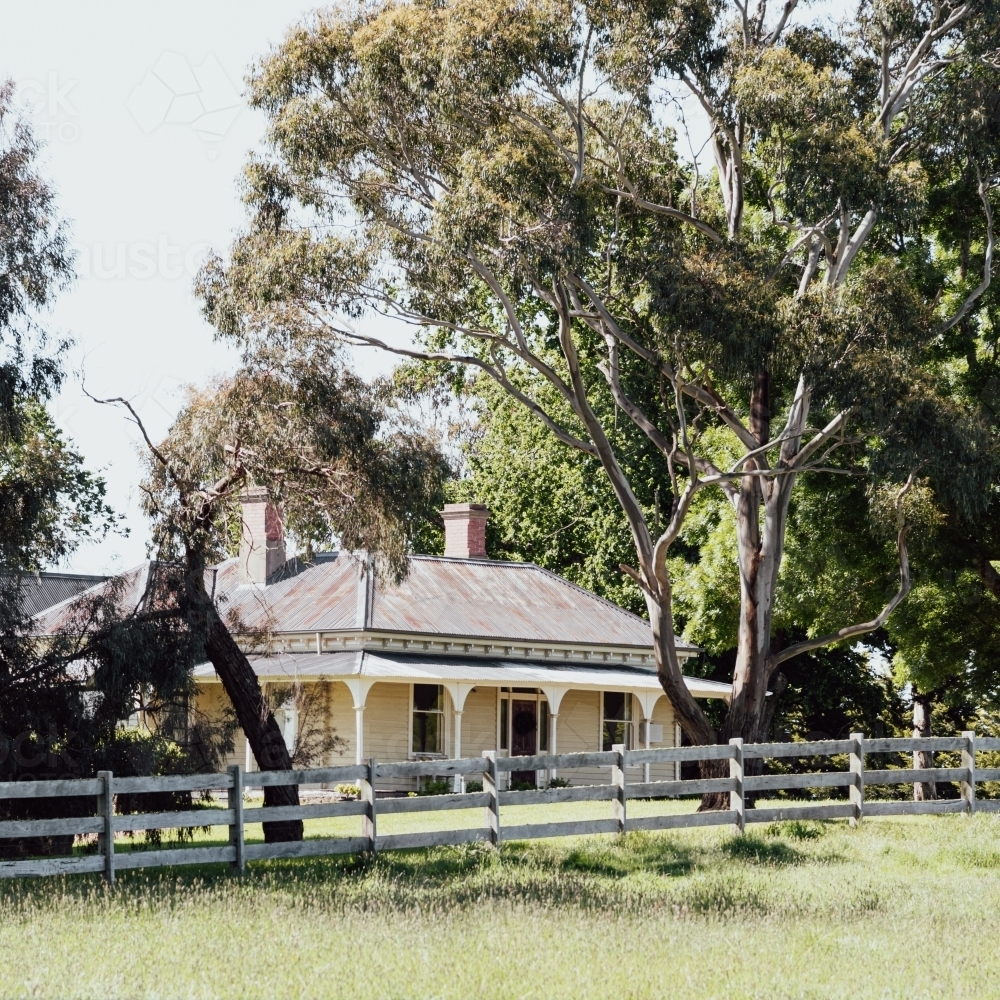 rural victorian home with wooden fence - Australian Stock Image