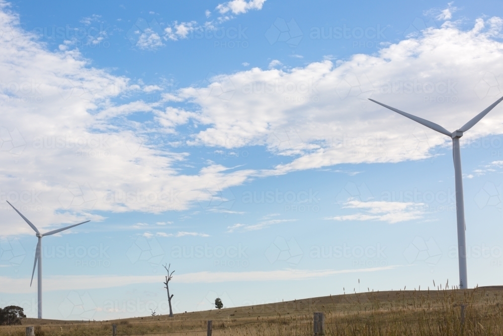 Rural Wind Turbines in a farm setting - Australian Stock Image