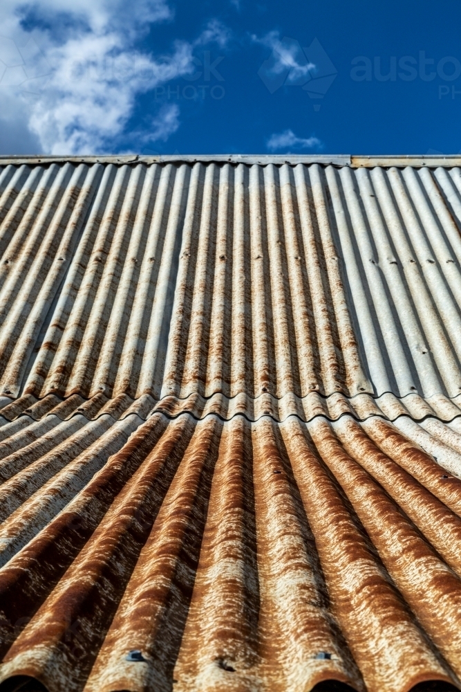 Rusty corrugated iron roof texture. - Australian Stock Image