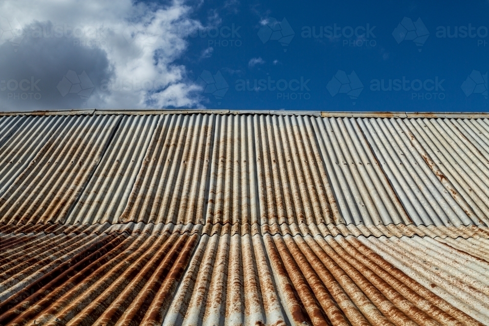 Rusty corrugated iron roof texture. - Australian Stock Image