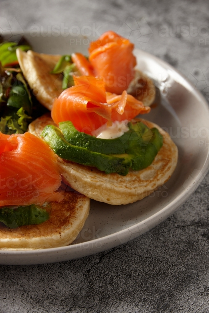 Salmon pikelets served with fresh garden salad. - Australian Stock Image