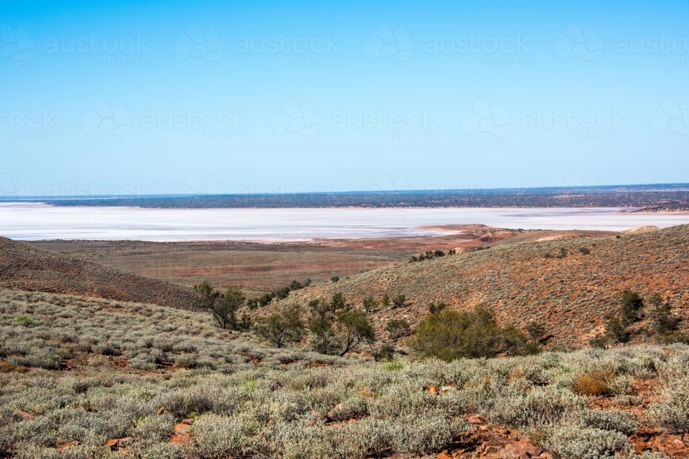 Saltlakes in the distant in arid Australian land. - Australian Stock Image