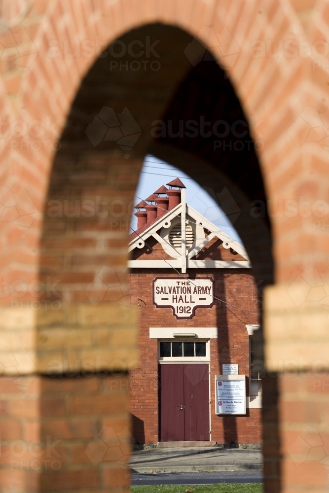 salvation army hall through brick arches - Australian Stock Image