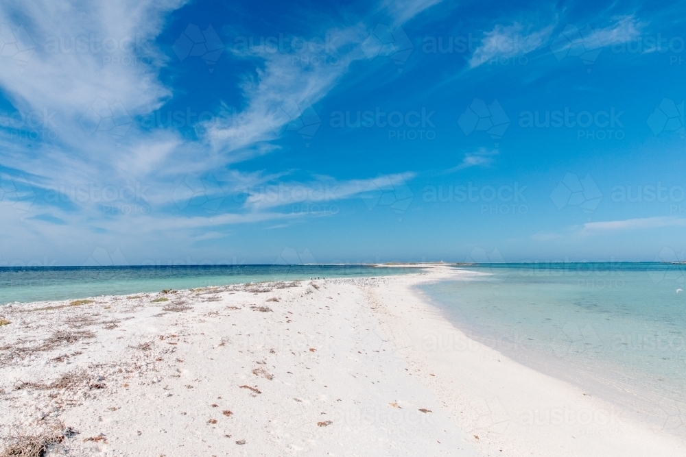 Sandy flat, desert Island with turquoise ocean and blue sky - Australian Stock Image