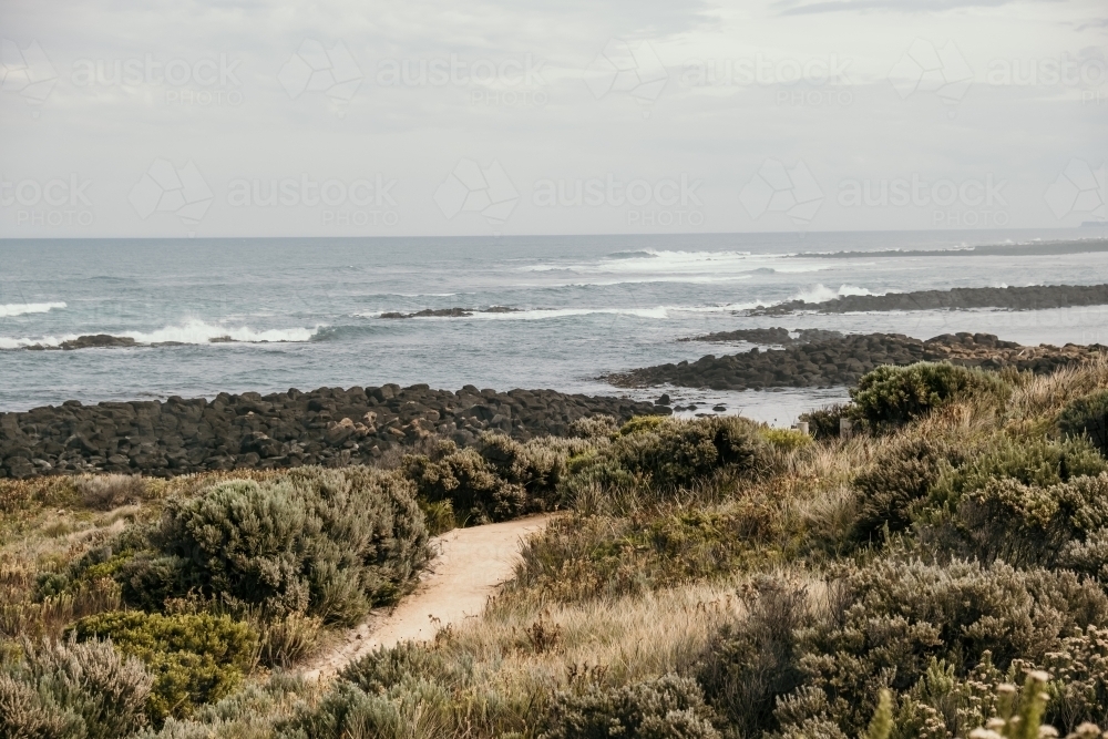 Sandy track to the ocean. - Australian Stock Image