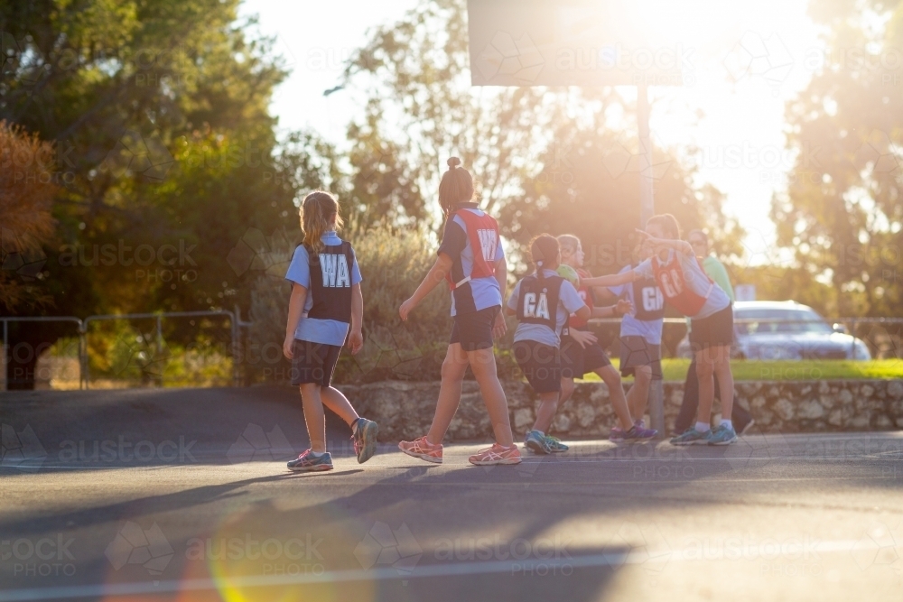 School children playing netball - Australian Stock Image